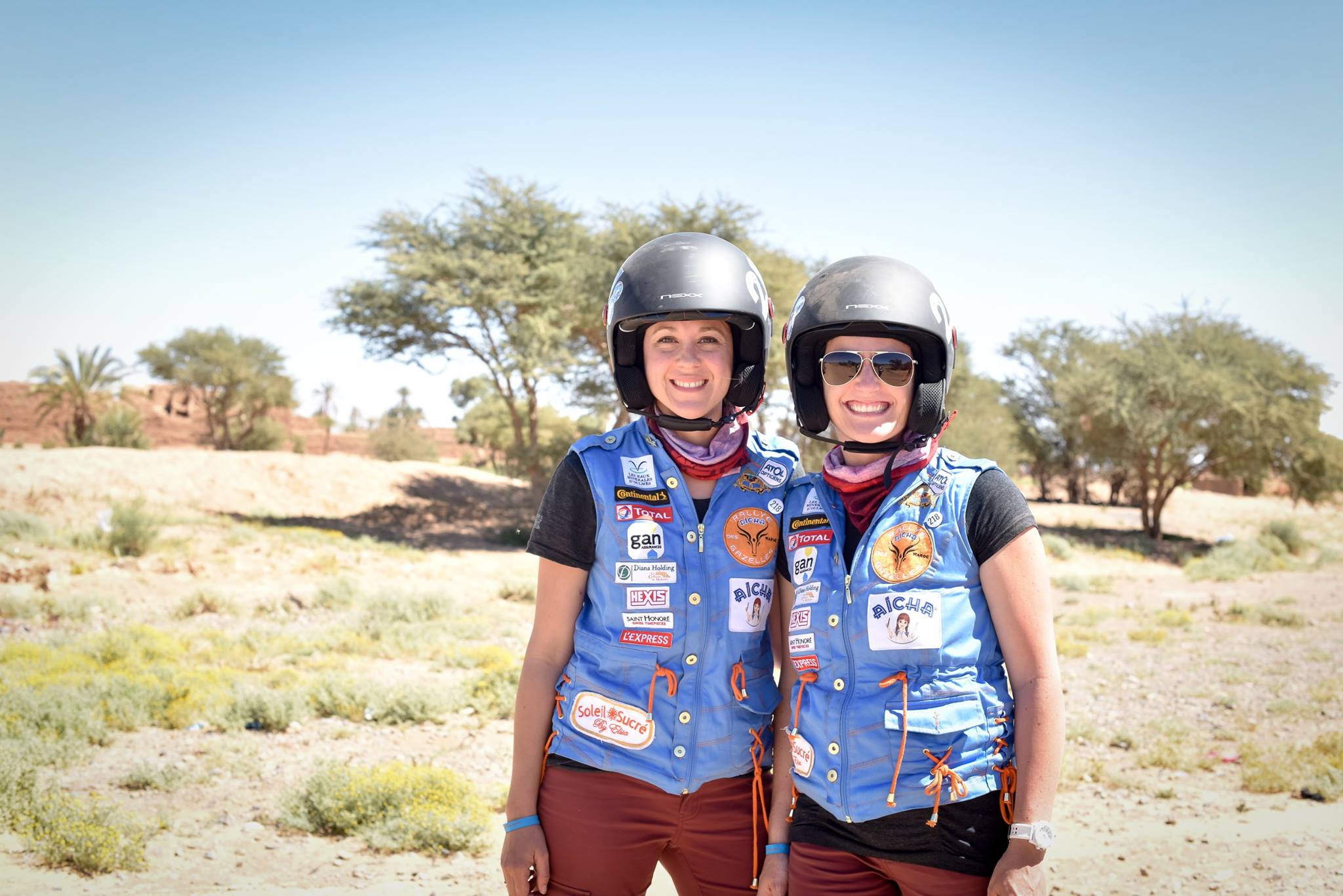 Rhonda Cahill and Rachelle Croft clad in their Team USA Rallye gear. overlanding
