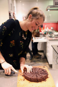 Haley Daniels preparing vegan food for a cooking class.