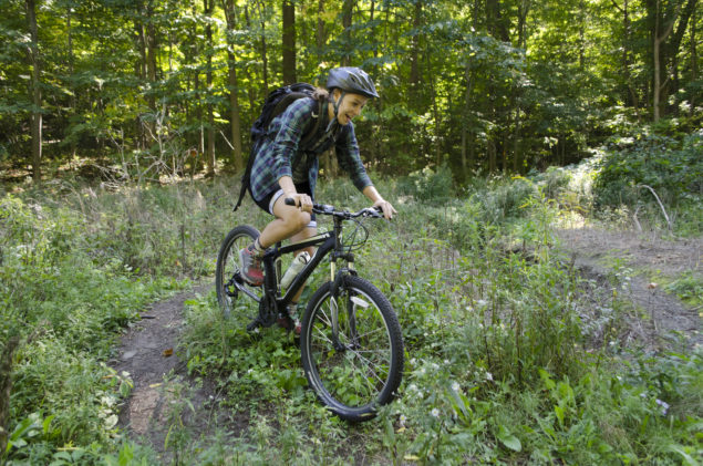 Sonya Pevzner mountain biking by Madison Moore.
