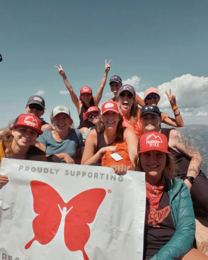 Author Alyx climbing Mt. Timpanogos with Freedom Hikers.